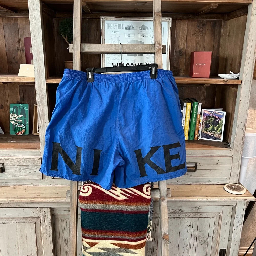 Nike Blue Athletic Shorts with Black Logo